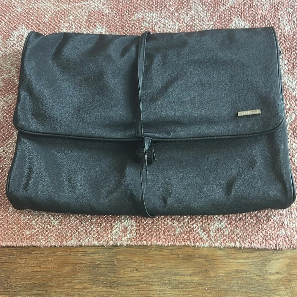 Celebrity zippered jewelry or makeup bag. Multiple storage sections.